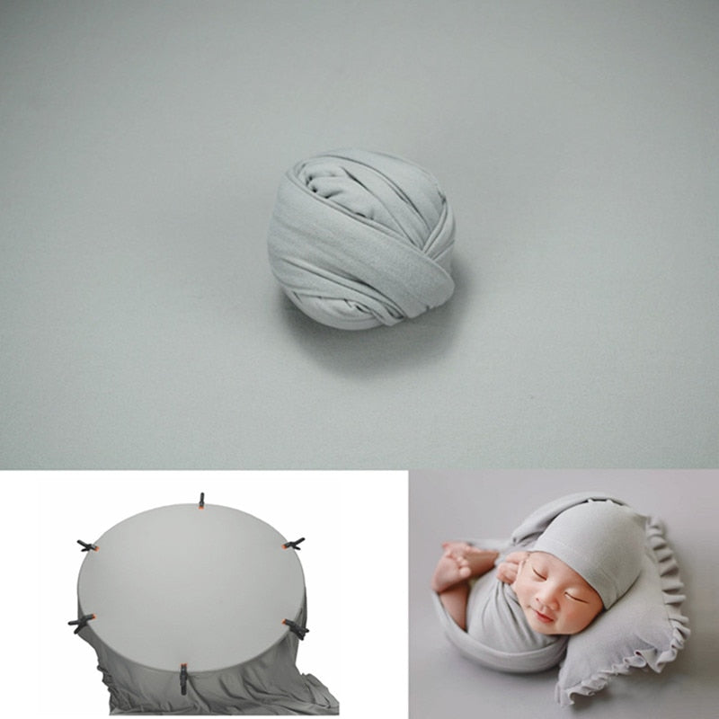 Infant photo accessories: simple white swaddle and large textured background blanket