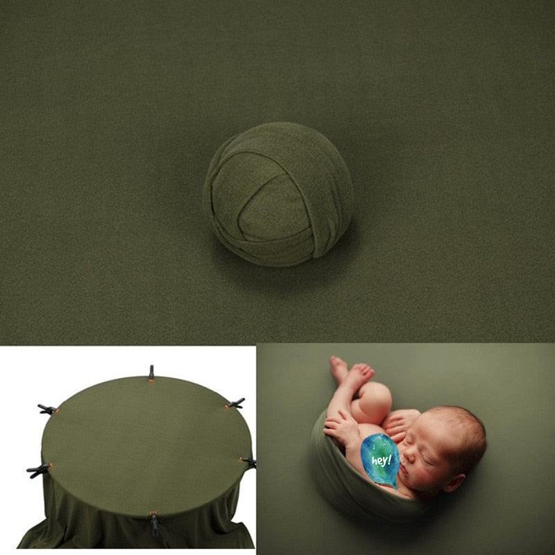 Soft baby swaddle and coordinated photography background blanket, essential infant accessories