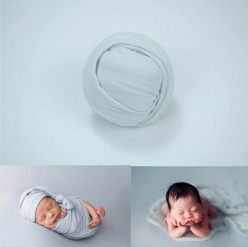 Unisex baby photography props: plain white swaddle wrap and simple backdrop blanket