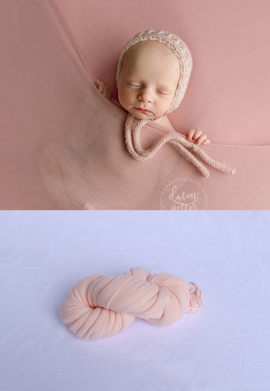 Infant sleep sack style cotton swaddle blanket, promoting secure and comfortable rest.