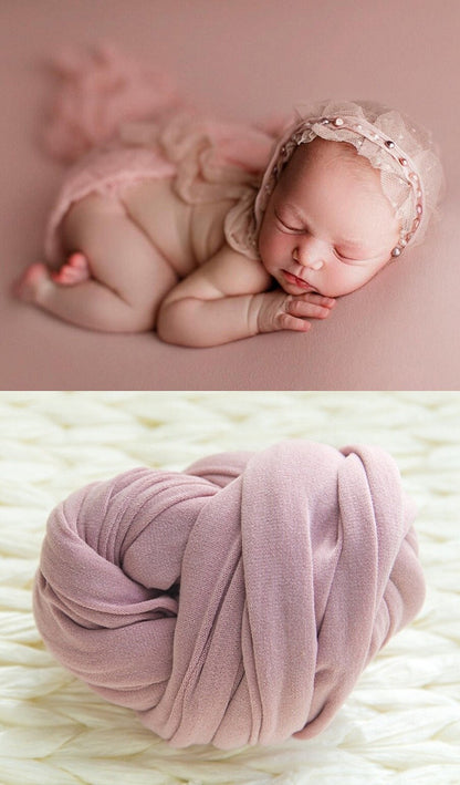 Versatile baby cotton swaddle blanket, also functions as a receiving blanket or stroller cover.