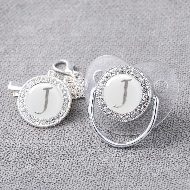 Elegant newborn silver bling pacifier and clip, a chic baby accessory and gift