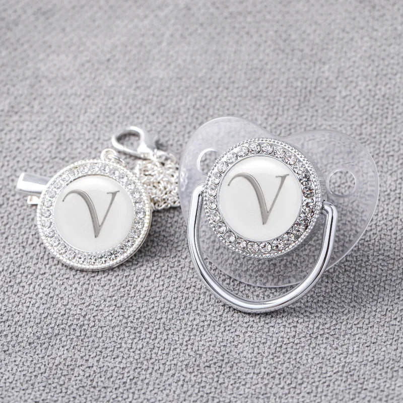 Newborn pacifier set: silver bling pacifier with a secure matching clip, luxury item