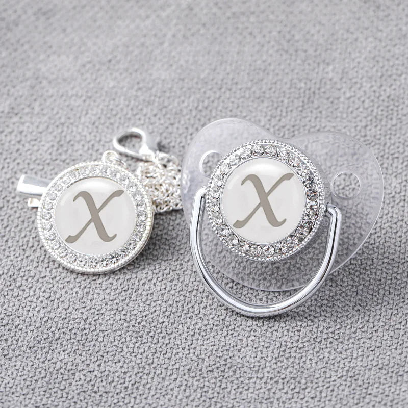 Luxury silver bling pacifier and clip set, suitable as a baby shower gift or personal use