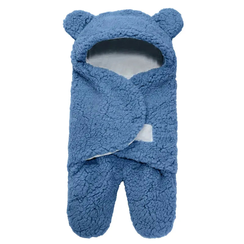 Warm newborn swaddle in soft flannel, providing secure sleep and comfort for infants.