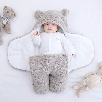 Soft flannel baby sleeping bag for newborns, perfect for winter warmth and secure swaddling.
