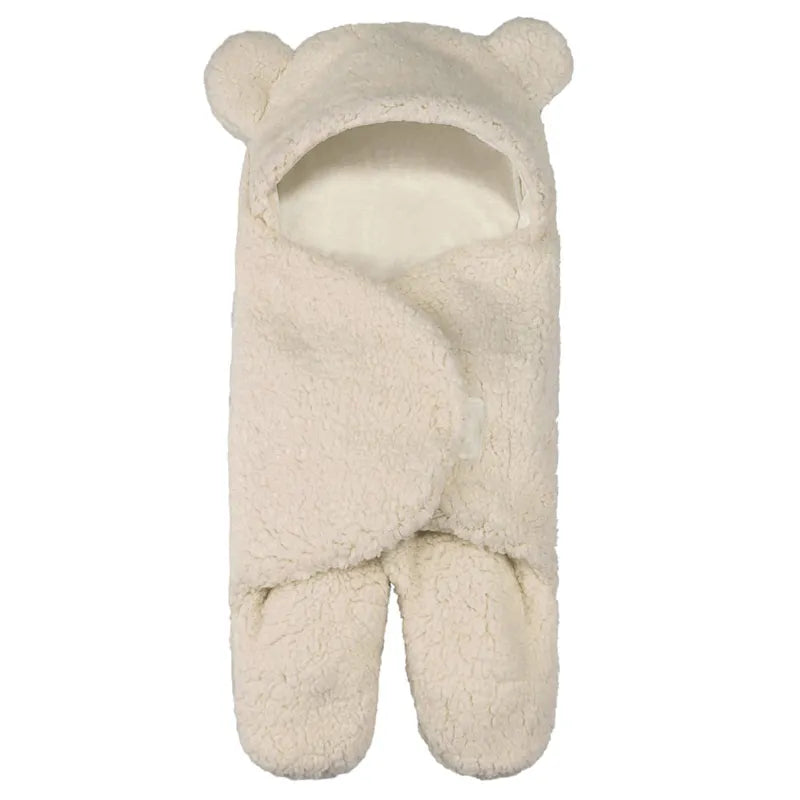 Cozy baby swaddle blanket, soft flannel material, ensuring warm and peaceful newborn sleep.