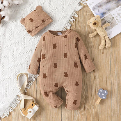 Unisex newborn white cotton romper with charming bear pattern, ideal long sleeve infant wear