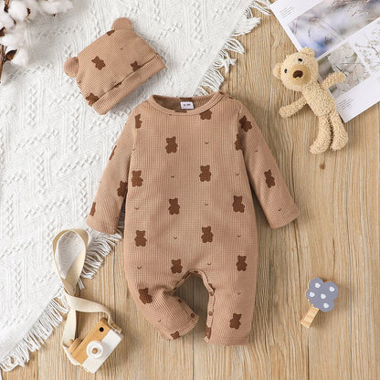 Organic cotton newborn romper featuring a sweet bear print, essential long sleeve baby clothing