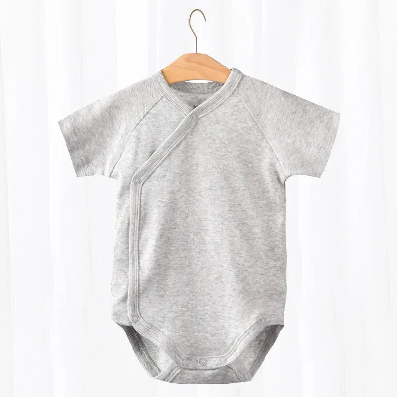 Newborn organic cotton short-sleeve romper, a soft and breathable unisex baby bodysuit