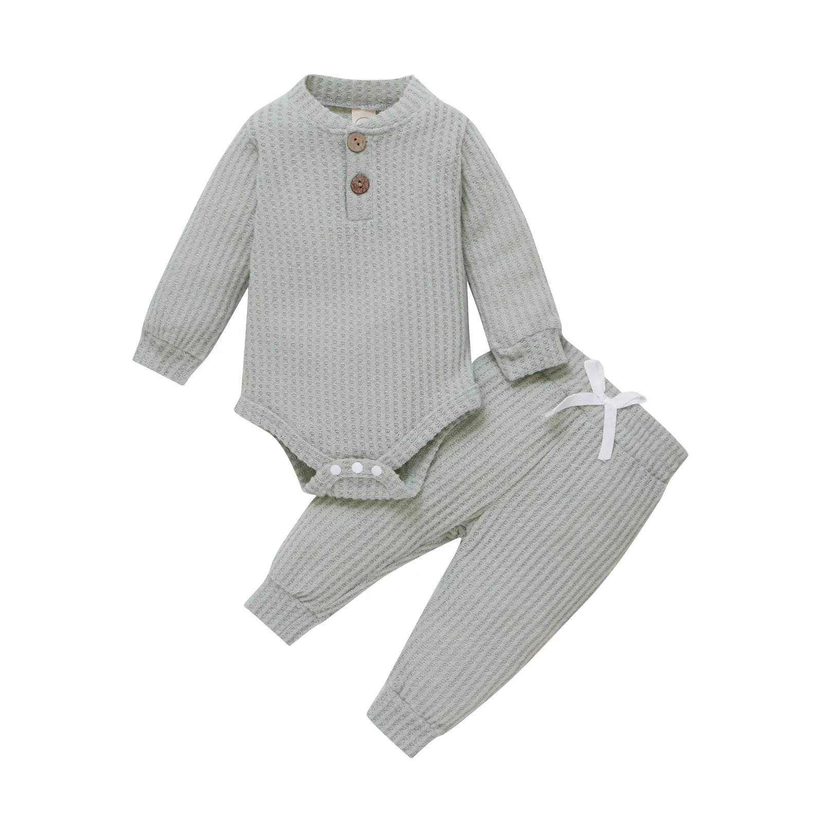Horizontal view of a newborn unisex ribbed plaid bodysuit and elastic pants set.
