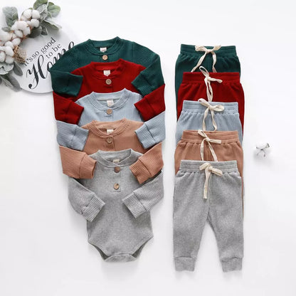 Unisex baby ribbed bodysuit with classic plaid pattern and matching elastic waist pants.