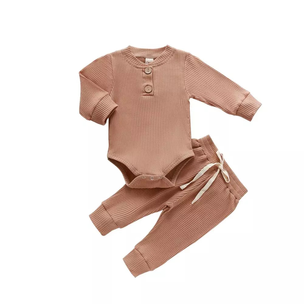 Baby unisex outfit for comfort: ribbed plaid bodysuit and gentle elastic pants.
