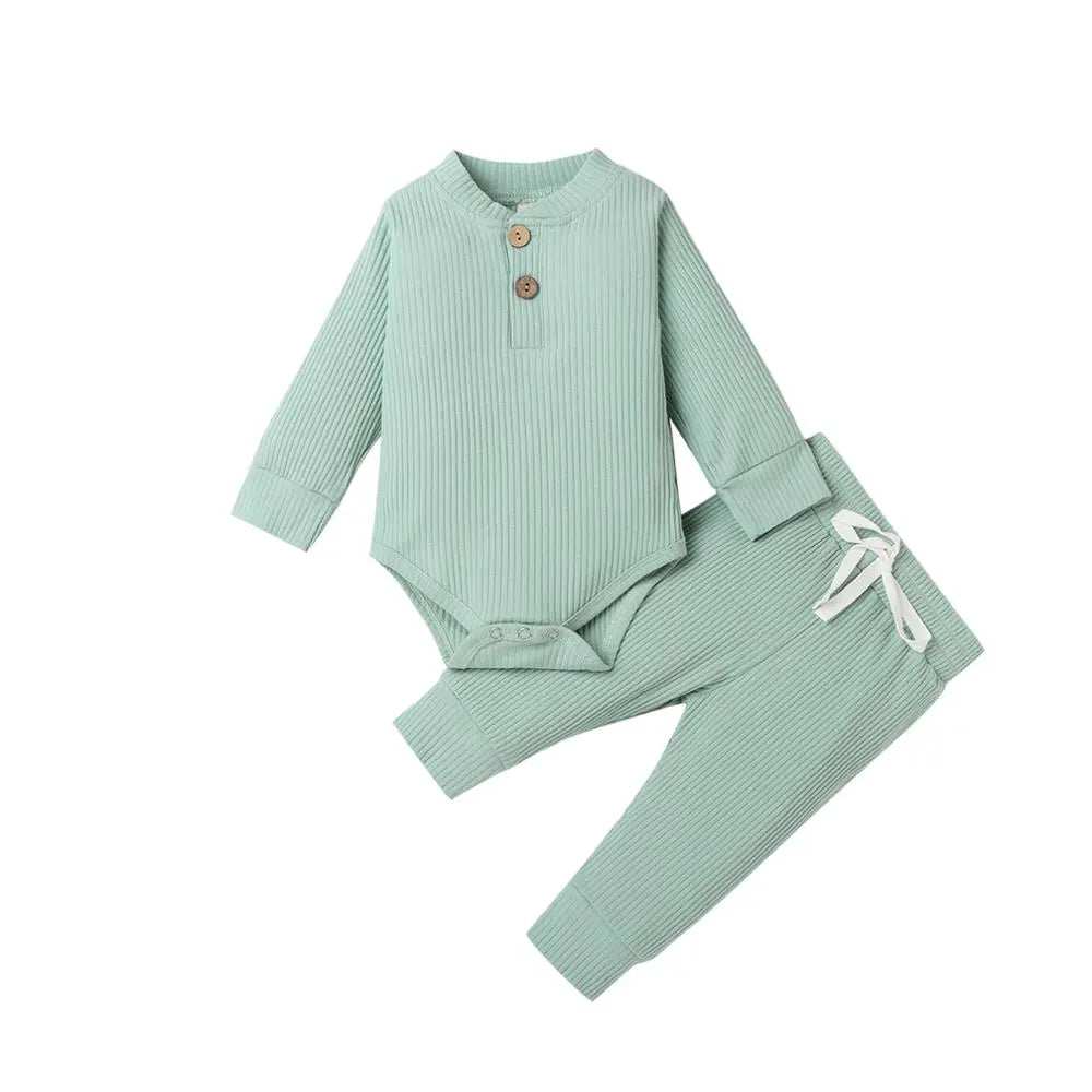 Stylish newborn unisex set: ribbed cotton plaid bodysuit and matching elastic pants.
