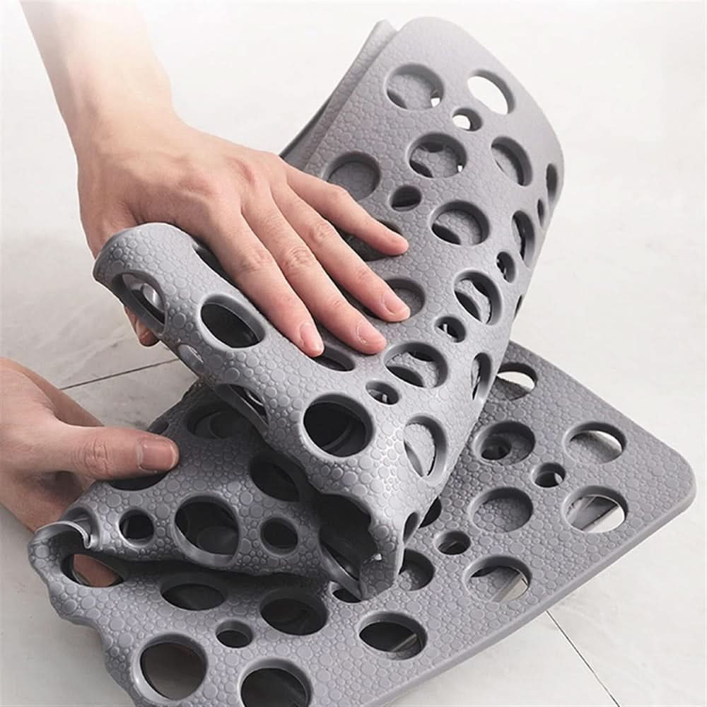 Non-slip bath mat protecting floors while ensuring secure footing in wet bathroom areas.