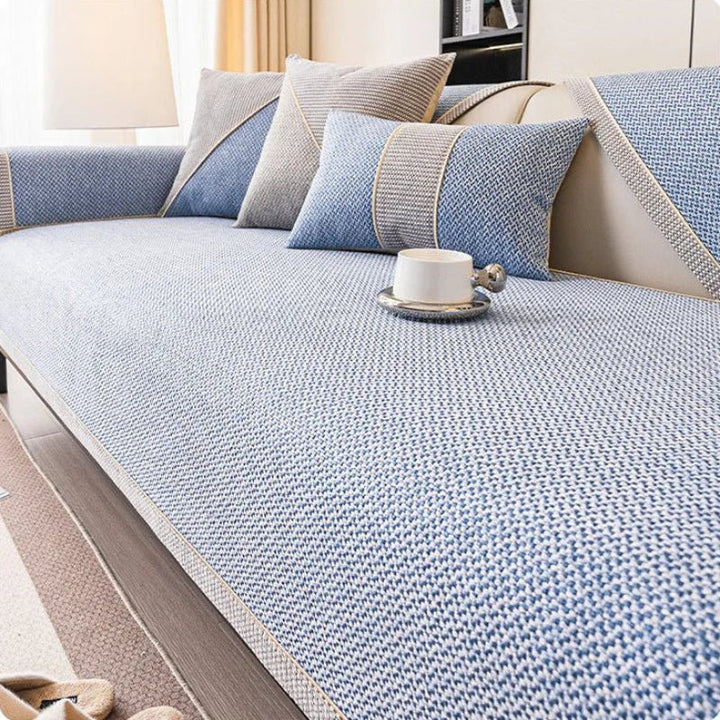 Non-slip modular sofa protector, quilted cotton-linen for a snug fit and all-season comfort.