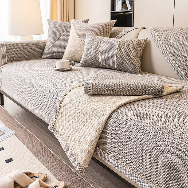 Quilted cotton-linen sofa protector, non-slip design for comfort & durability. All-season use.