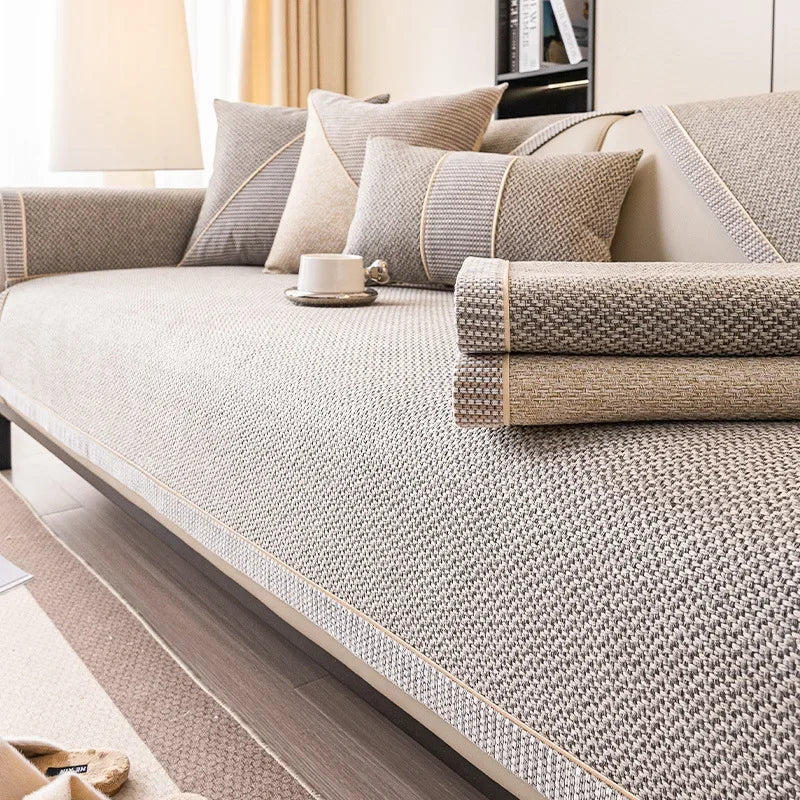 Modern non-slip sofa protector, cotton-linen blend, enhances living room decor. All season comfort.