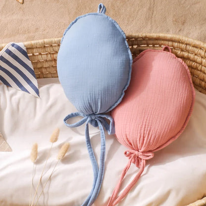 Nordic style balloon baby pillow in light gray, perfect for nursery decor and photo shoots