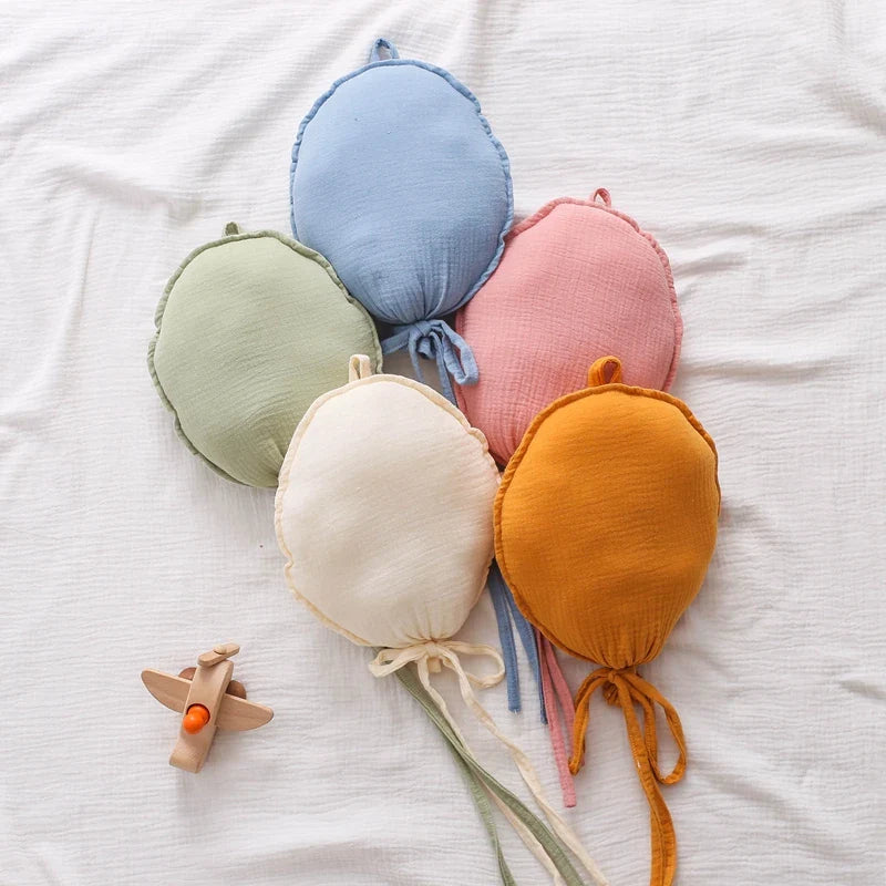 Detailed view of the stitching on a Nordic balloon baby pillow, emphasizing durability for kids