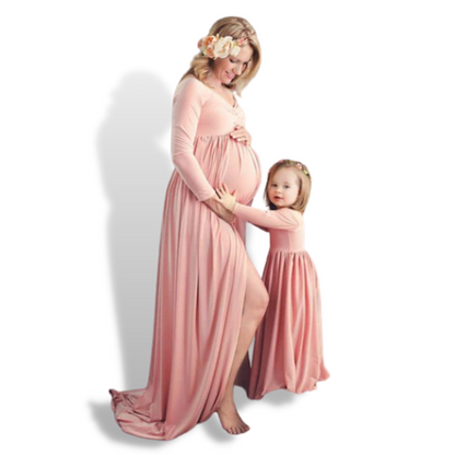 Off-shoulder maternity maxi dress in pink, perfect for pregnancy fashion and a mom and me matching outfit.