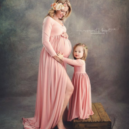Elegant women's off-shoulder maxi dress in white, a versatile maternity dress and matching outfit option.