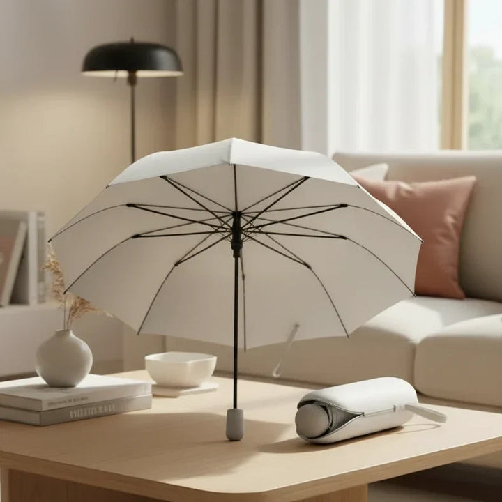 Open ultra-compact travel umbrella providing stylish rain protection. Lightweight, portable weather gear for men & women.