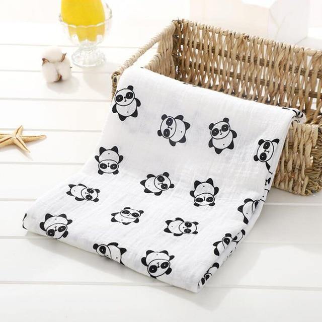 Organic cotton baby muslin swaddle blanket for peaceful sleep, soft and breathable newborn comfort