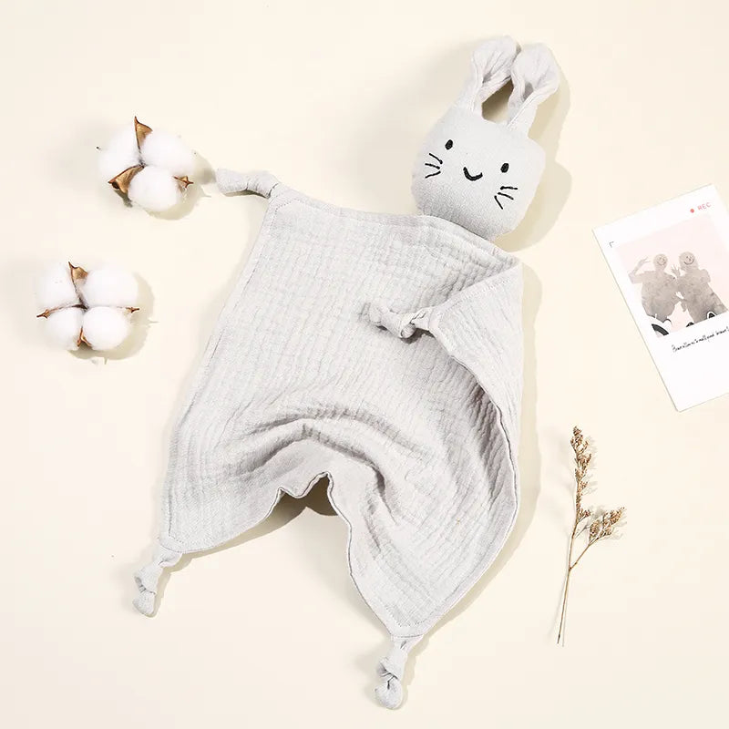 Gentle organic cotton infant comfort blanket with a charming grey cat doll