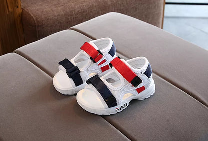 Group of assorted color children's sport sandals, ideal for families needing diverse footwear options.