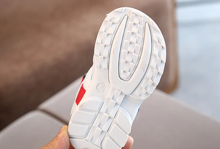 Youth sized blue sport sandals with soft sole and hook-and-loop closure, practical for beach and play.