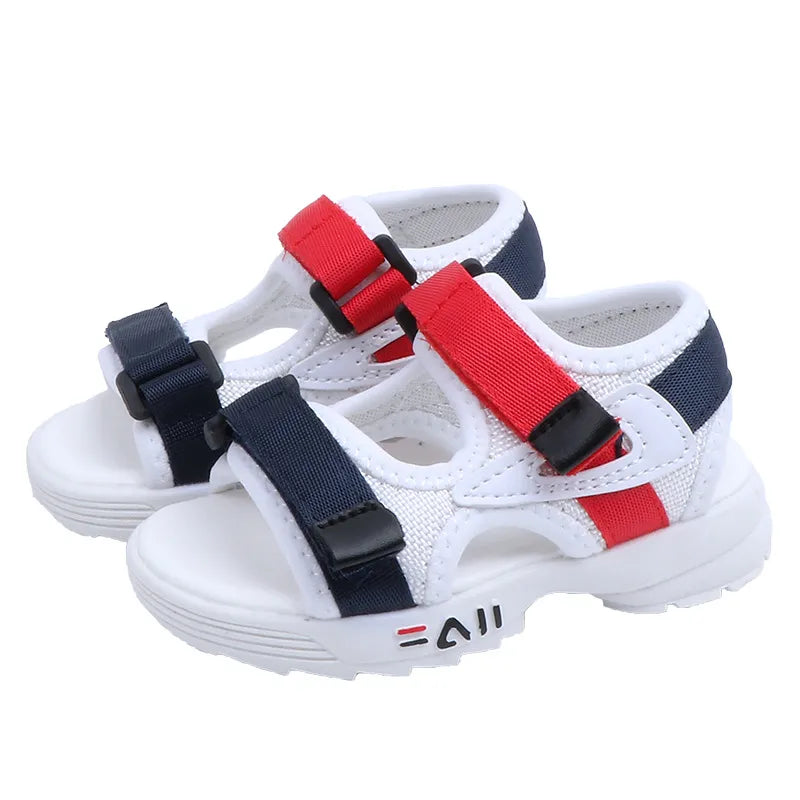 Collection of colorful children's sport sandals in blue, red, green, and orange, for summer toddler wear.