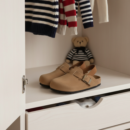 Pair of blue kids' comfort clogs with adjustable strap, perfect for toddlers' playtime