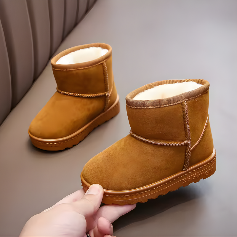Pair of brown fur-lined kids' winter boots with non-slip sole, perfect for warmth and outdoor play.