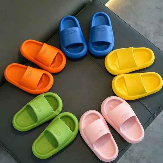 Pair of colorful kids EVA summer slippers, lightweight and breathable for toddlers and children