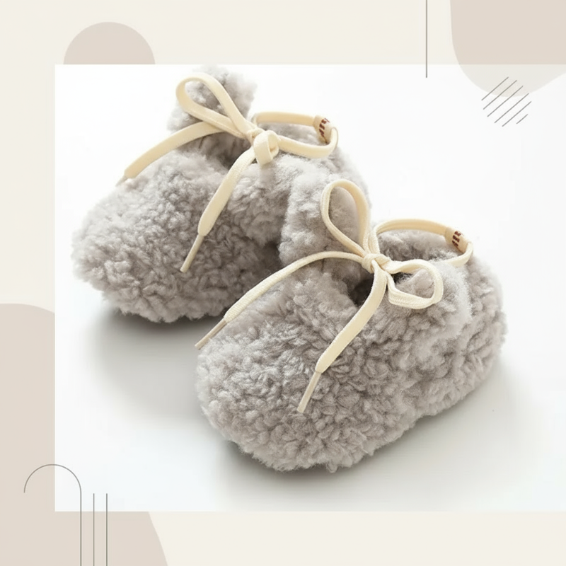 Infant fashion shot with non-slip booties, stylish and warm baby shoes.