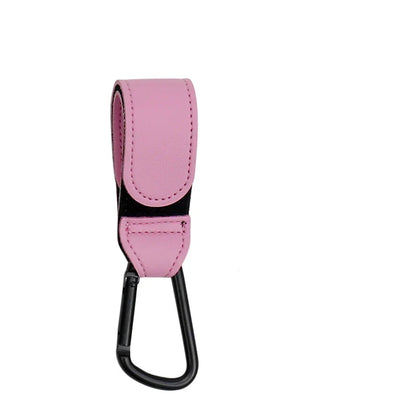 Close-up view of the strong stitching on a brown PU leather stroller hook strap