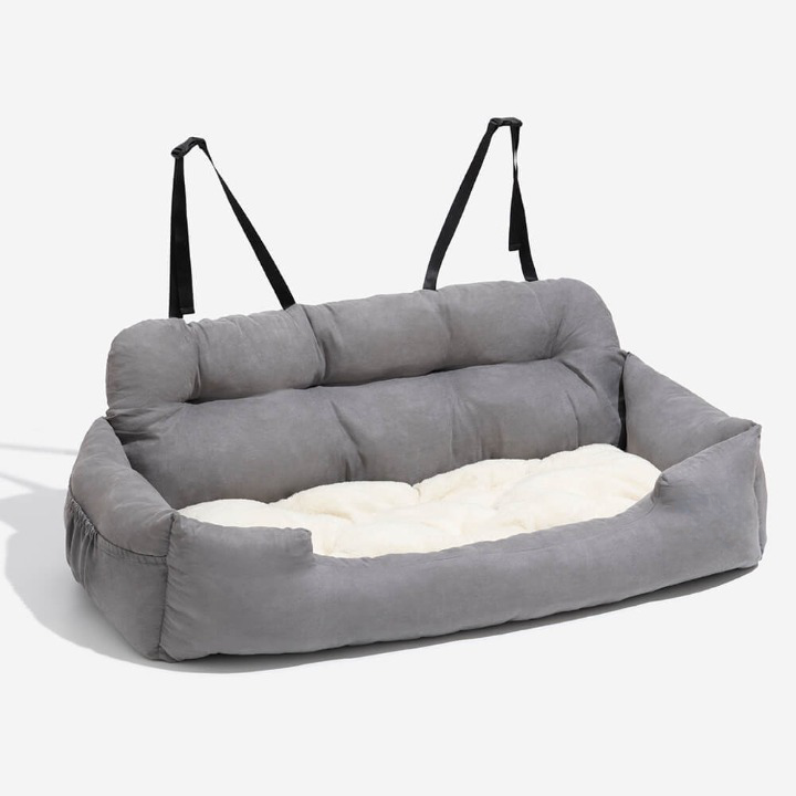 Luxury pet car seat bed for dogs, ensuring secure & comfortable backseat travel. A washable accessory for pets.