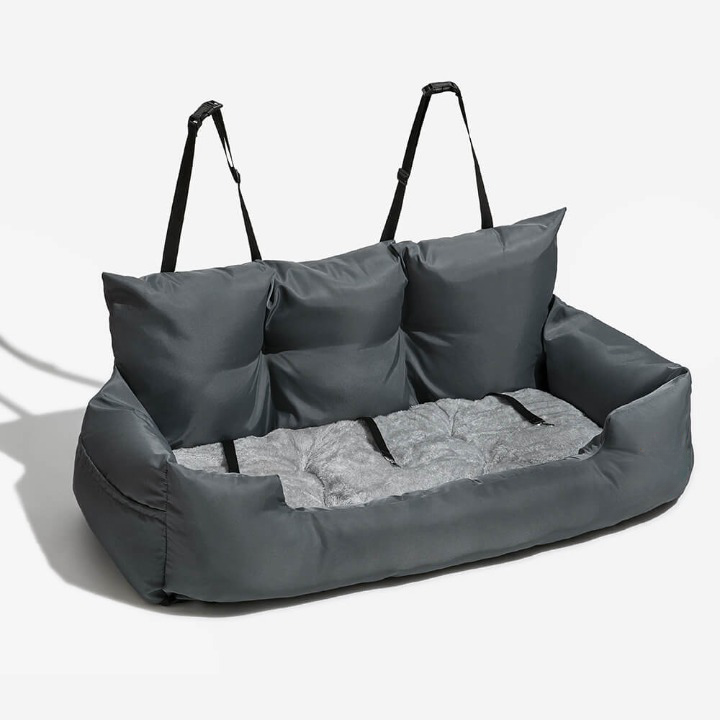 Safe pet travel with this PawsRest dog car bed. Plush & washable, provides comfort for medium & large dogs on trips.