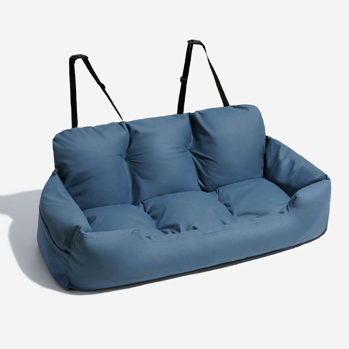 Durable dog car bed offering safe travel for pets. This washable, plush accessory provides ultimate comfort for dogs.
