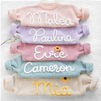 Children's personalized knit top featuring 'Emma' in red, comfortable cotton blend apparel.