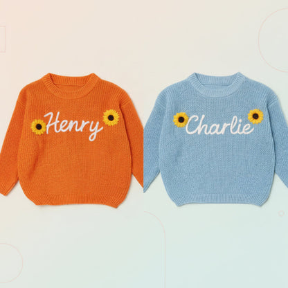 Baby clothing: personalized knit sweater, 'Ava' in yellow, soft cotton blend for comfort.