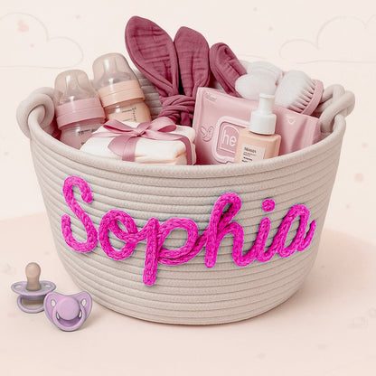 Portable personalized diaper caddy, soft cotton basket with handles for baby's necessities.