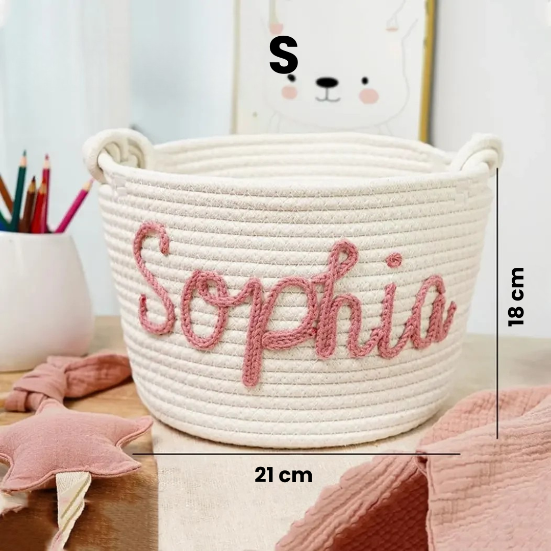 Personalized white diaper caddy with delicate script, essential home organization for baby items.
