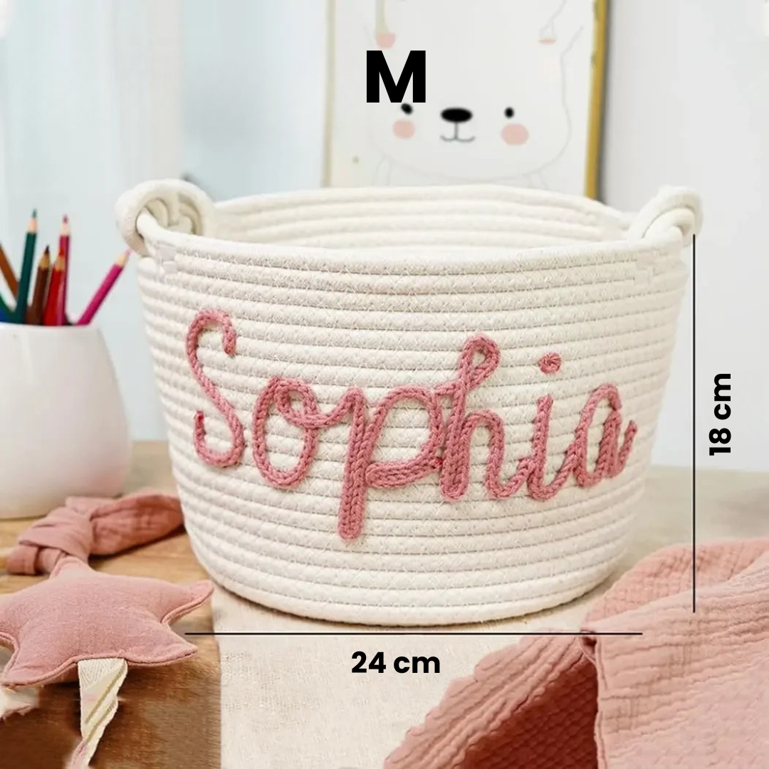 Diaper caddy with custom initial, practical nursery storage basket in soft organic cotton.
