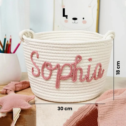 Close-up of personalized baby diaper caddy featuring embroidered name, quality baby gift.