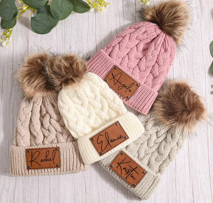 Personalized pink knit pom pom beanie hat for toddlers with custom name embroidery