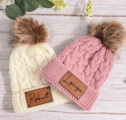 Soft knit personalized baby hat with a fluffy pom pom, warm and stylish infant apparel