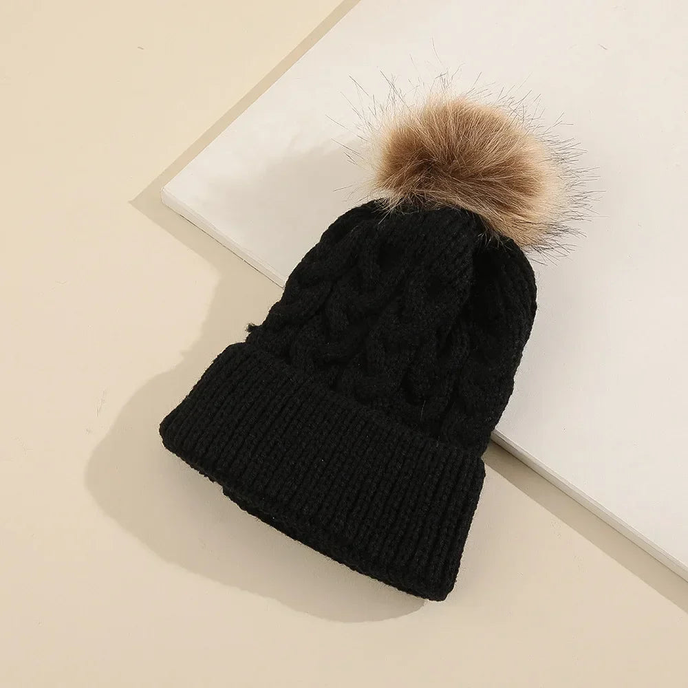 Close-up of embroidery on a personalized knit beanie, high-quality children's fashion