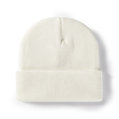 Adult wearing a unisex personalized beanie, 'G' initial, stylish vegan leather patch